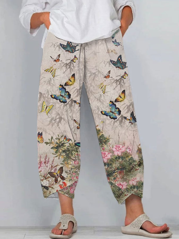 Pantalones casuales con bolsillos y estampado de flores y mariposas para mujer 